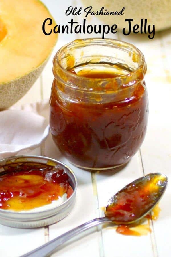 Cantaloupe jelly in a jar with a spoon next to it  - title text overlay.