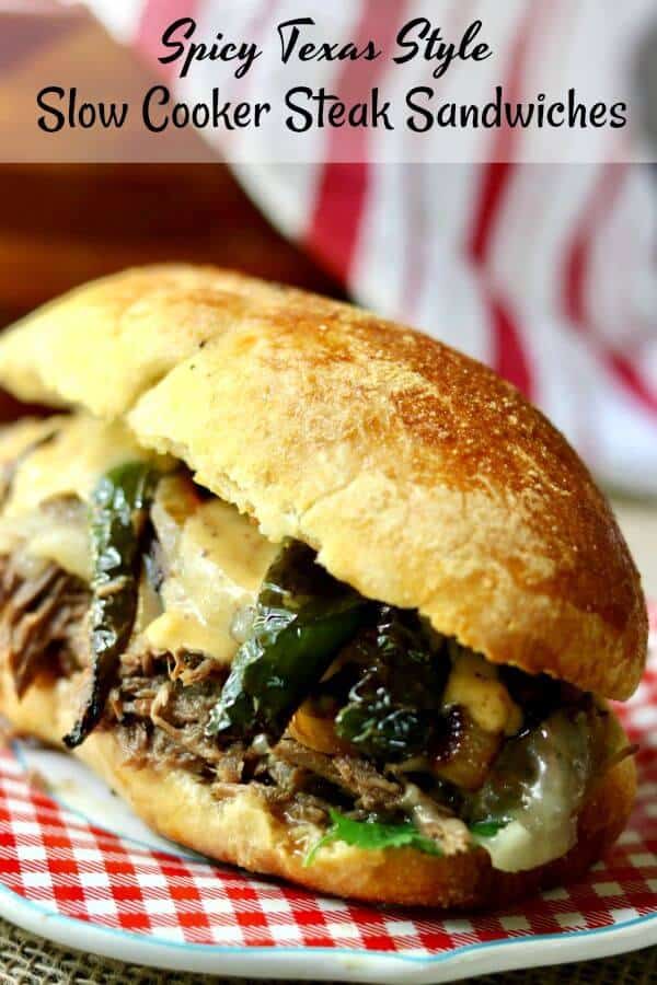 Slow cooker steak sandwiches are full of BIG Texas flavor from the cornmeal sandwich rolls to the chipotle aioli but the real star of this show is the beef! From RestlessChipotle.com