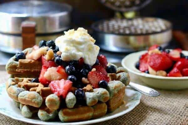 Blue cornmeal waffles are a unique change from your favorite breakfast waffles! From RestlessChipotle.com