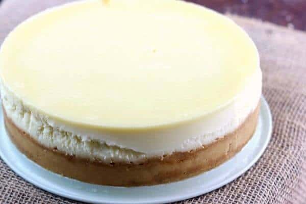 Plain cheesecake recipe is the best homemade cheesecake ever AND the perfect foundation for thousands of variations!Β Here's the secret to a perfectly smooth top! From RestlessChipotle.com