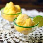 easy peach sorbet is full of summer flavor. So delicious! From RestlessCHipotle.com