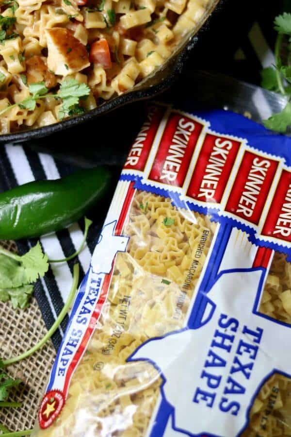 Southwest Chicken Pasta is going to be a family favorite weeknight meal. Tender chicken in a cheesy, southwestern sauce is mixed with pasta and done in 30 minutes. From RestlessChipotle.com