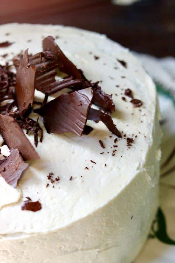 dark chocolate layer cake recipe with a smooth and creamy Irish buttercream frosting. It's so good! Perfect for the chocolate lover in your life. from RestlessChipotle.com