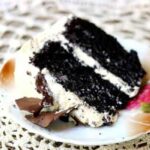 Easy dark chocolate layer cake with a delicious Irish cream buttercream. from RestlessChipotle.com