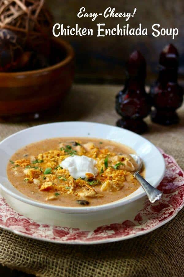 Title image - white bowl of cheesey enchilada soup is placed on a red transferware plate