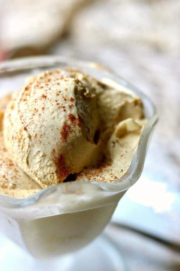Golden cinnamon gelato ice cream in a glass.