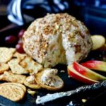 Quick and easy apple cheddar cheese ball recipe is sumptuously full of fall flavors from tangy apple and maple to sharp cheddar and toasted pecans. Easy holiday appetizers! From RestlessChipotle.com