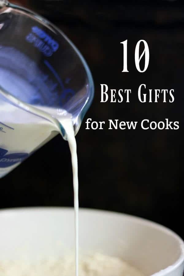 Best Gifts for Beginnning Cooks title image-Stream of milk pours from a measuring cup on a dark background