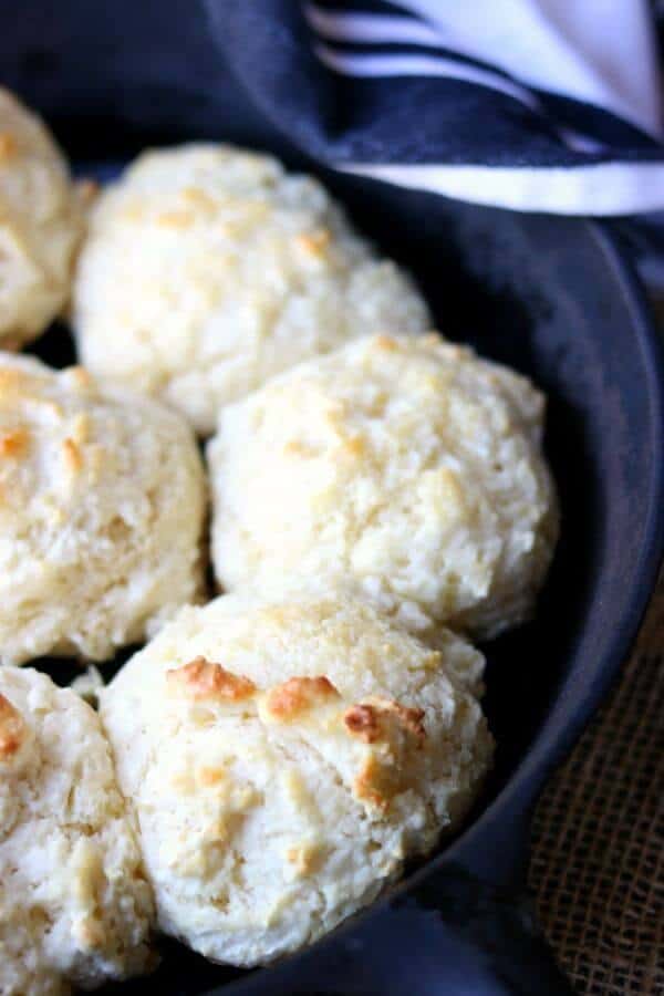 Closeup of golden brown drop biscuits hot out of the oven