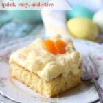 A serving of mandarin orange cake on a plate.