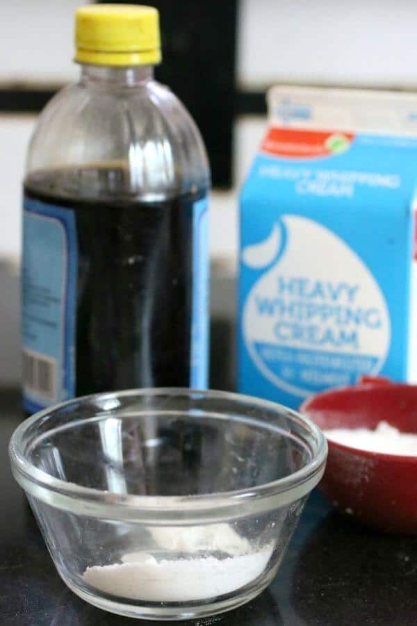 The ingredients for homemade Cool Whip placed on a counter.