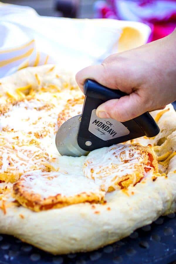 Using a pizza stone on the grill makes this a quick easy dinner- make this fried green tomato pizza with smoky cheese and whole wheat crust! #restlesschipotle #mondavi #recipe #howtomake #howtocook #homemade "<center