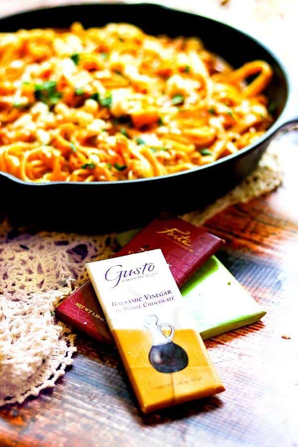 Pumpkin ALfredo in the background with forte chocolates in the foreground