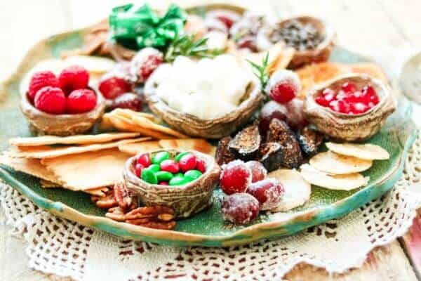 christmas dessert plate with red and green m&ms on it.