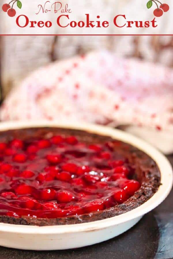 Oreo cookie crust with cherries inside it.