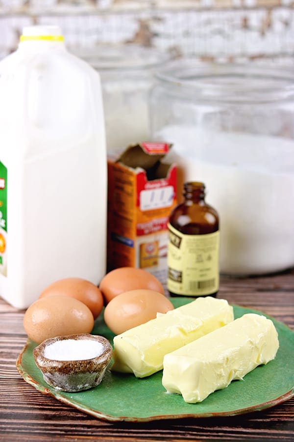 All of the ingredients for buttermilk poundcake on a table.