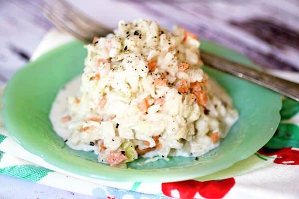 A pile of creamy coleslaw on a plate