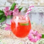 A dirty shirley cocktail in a balloon glass.