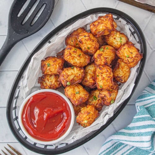 Overhead view of a plate of homemade tater tots.