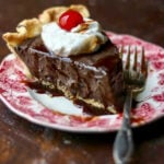 Closeup of a slice of chocolate cream pie.