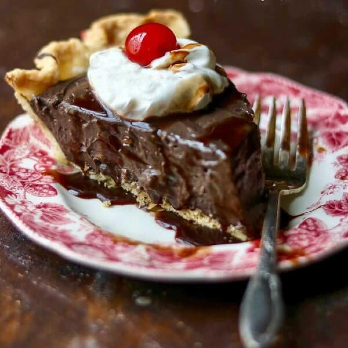 Closeup of a slice of chocolate cream pie.