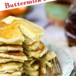 Stack of buttermilk pancakes cut to show interior. Title image with text overlay.