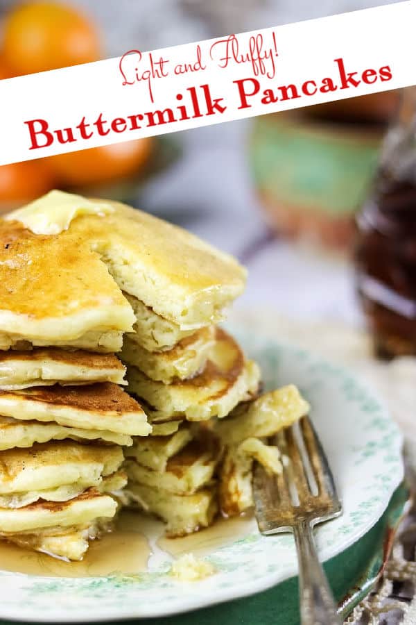 Stack of buttermilk pancakes cut to show interior. Title image with text overlay.