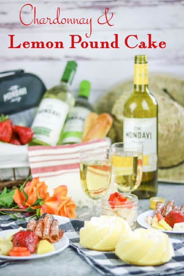 Picnic set up with 2 individual sized lemon pound cakes. Title overlay "Chardonnay and Lemon Pound Cake"