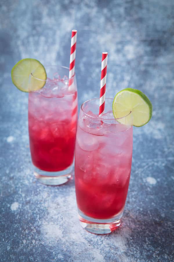 Two tall glasses of pretty pink Long Beach Iced Tea.