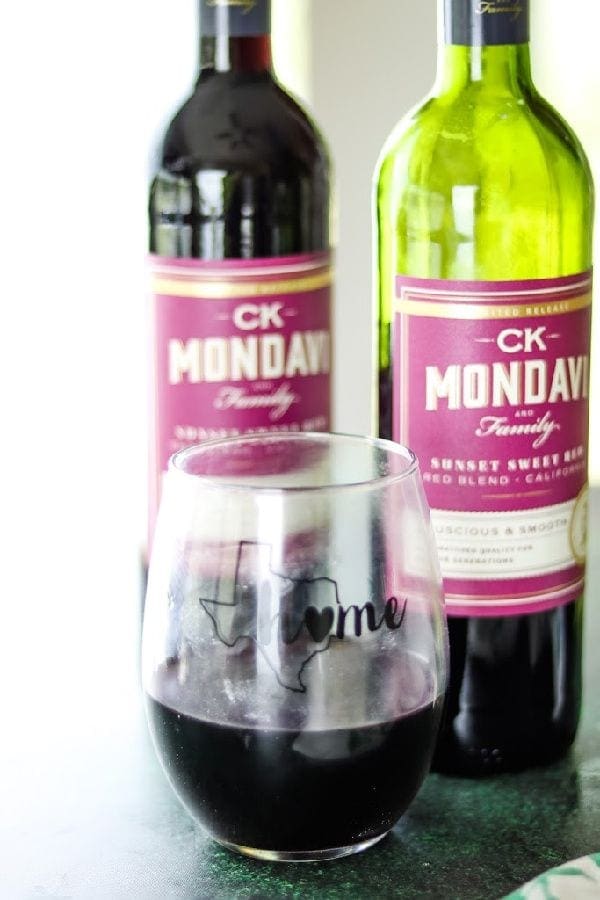 2 bottles of CK Mondavi and Family Sunset Sweet Red Blend wine.