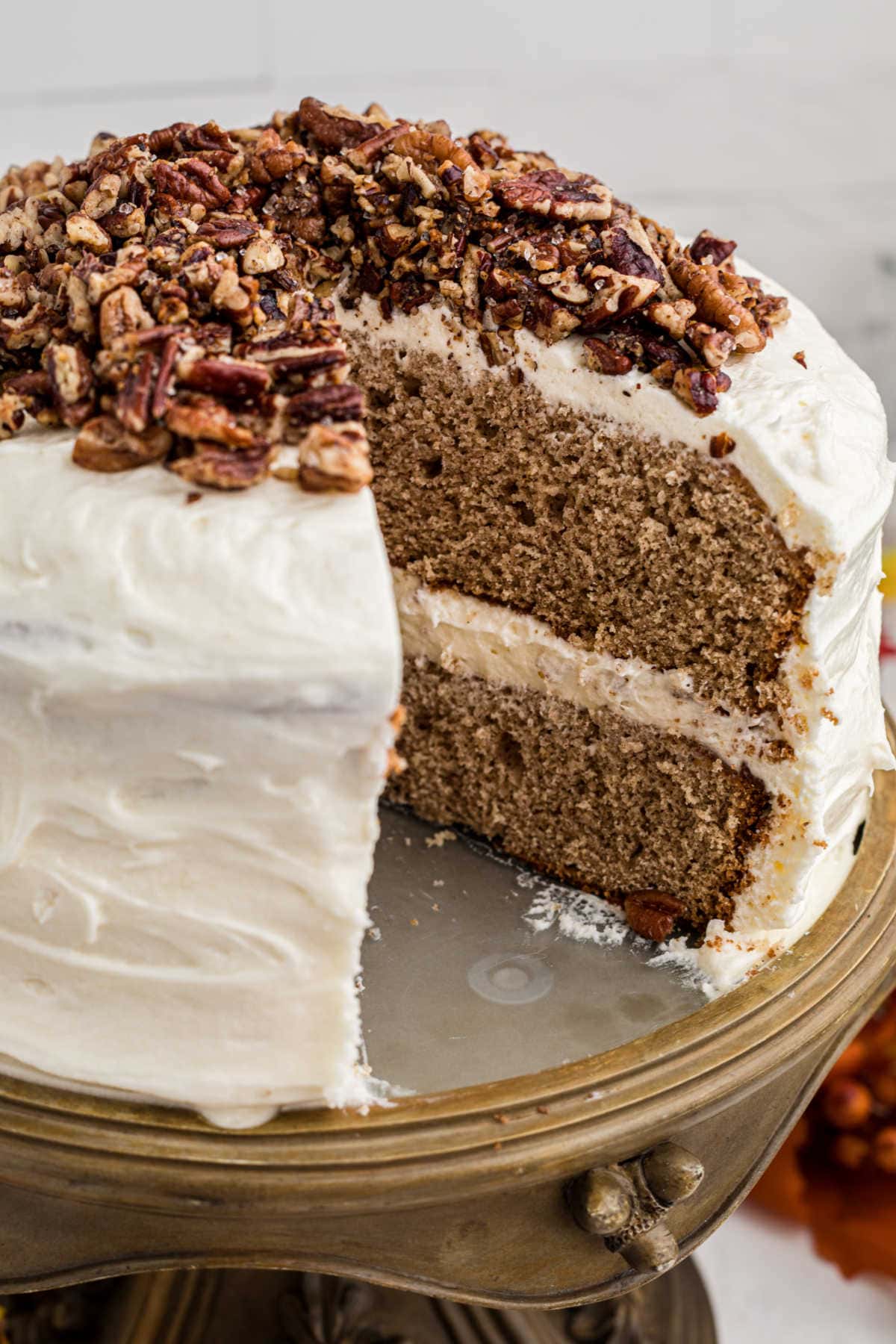 A cake with a slice removed to show the layers.