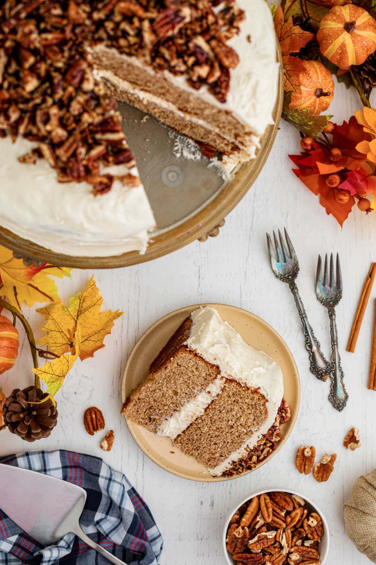 Overhead view of a table with a spice cake on it.