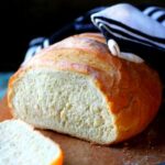 Sliced loaf of bread showing inside texture.