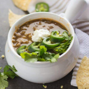 Closeup of the finished soup with a cilantro garnish.