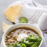 Overhead view of soup with text overlay for Pinterest.