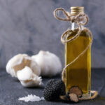 small image of a bottle of olive oil with truffles at the base.
