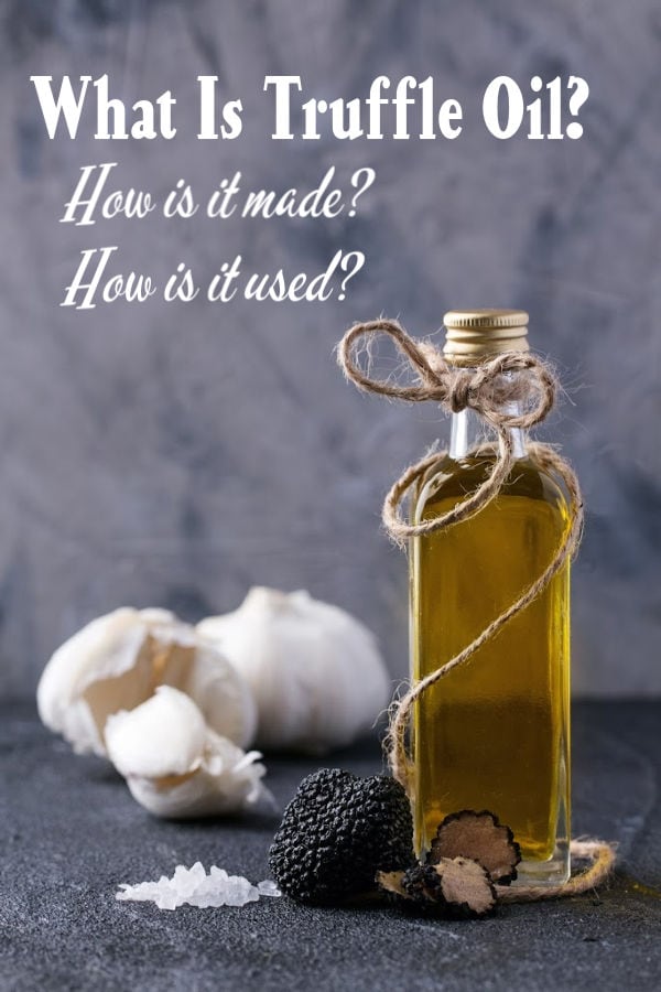 A bottle of truffle oil with a truffle at the base, garlic in background. Title text overlay.