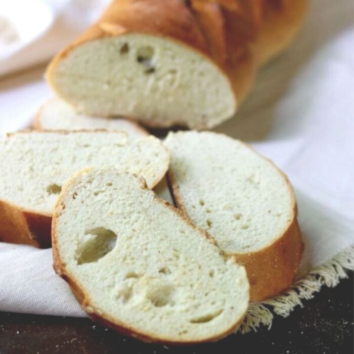 Slices of French bread on a linen cloth.