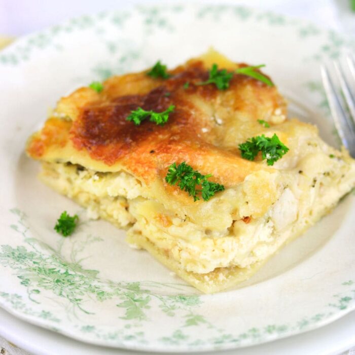 Closeup of a serving of the chicken Alfredo lasagna.