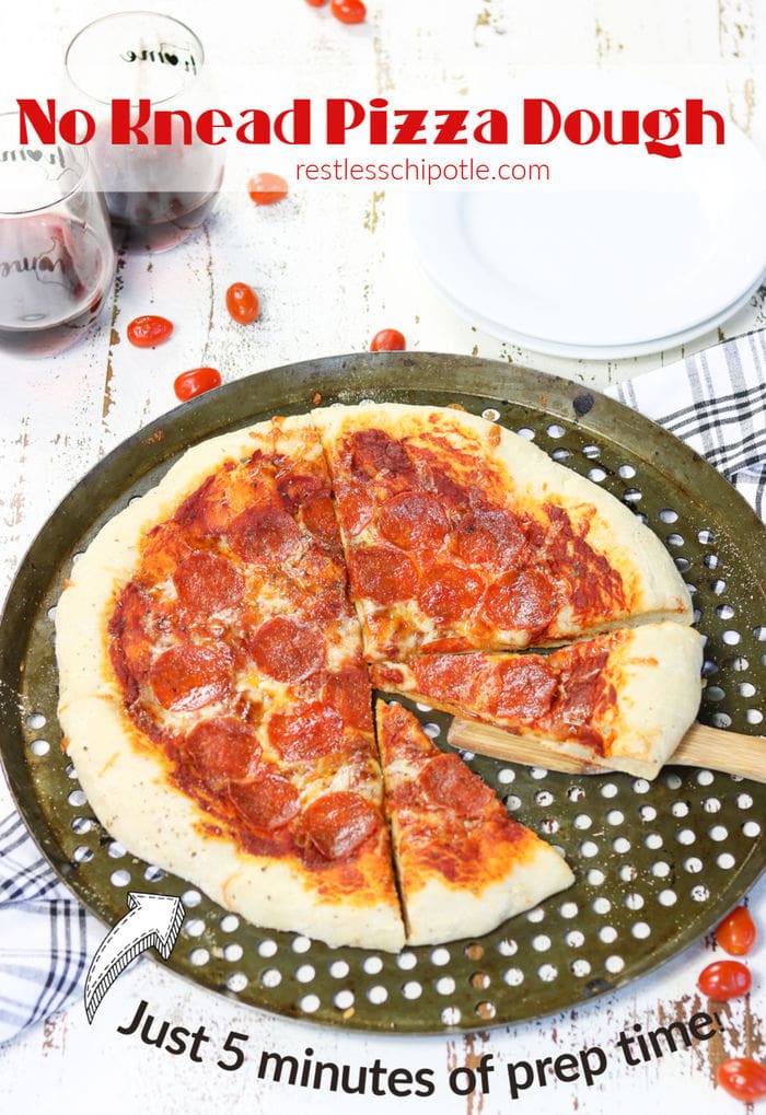 Shot of a finished pizza with title text overlay for Pinterest