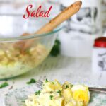 A dish of potato salad with text overlay for Pinterest.