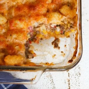 Casserole with a serving taken out showing the inside texture.