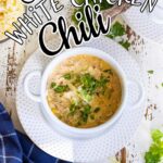 Chicken chili in a bowl with text overlay for Pinterest.