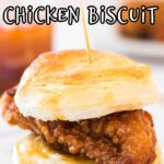 A honey butter chicken biscuit on a plate.