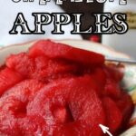 Red apple rings in a serving dish with text overlay for Pinterest.