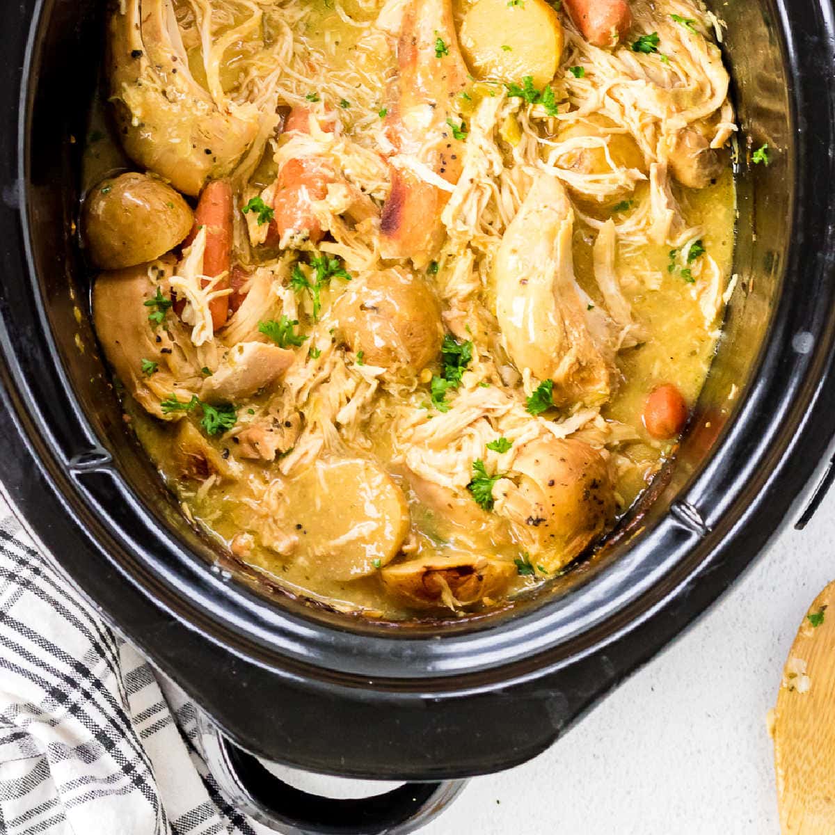 Ranch chicken in the slow cooker waiting to be served.