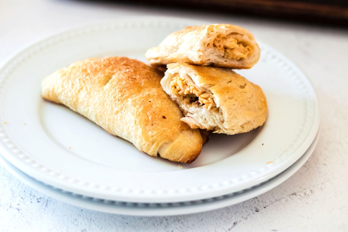 Empanadas cut open to see interior.