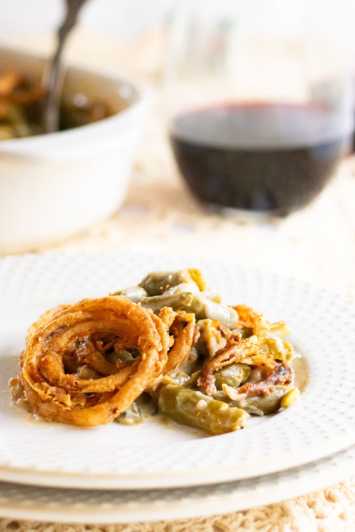 Closeup view of a serving of casserole on a plate.