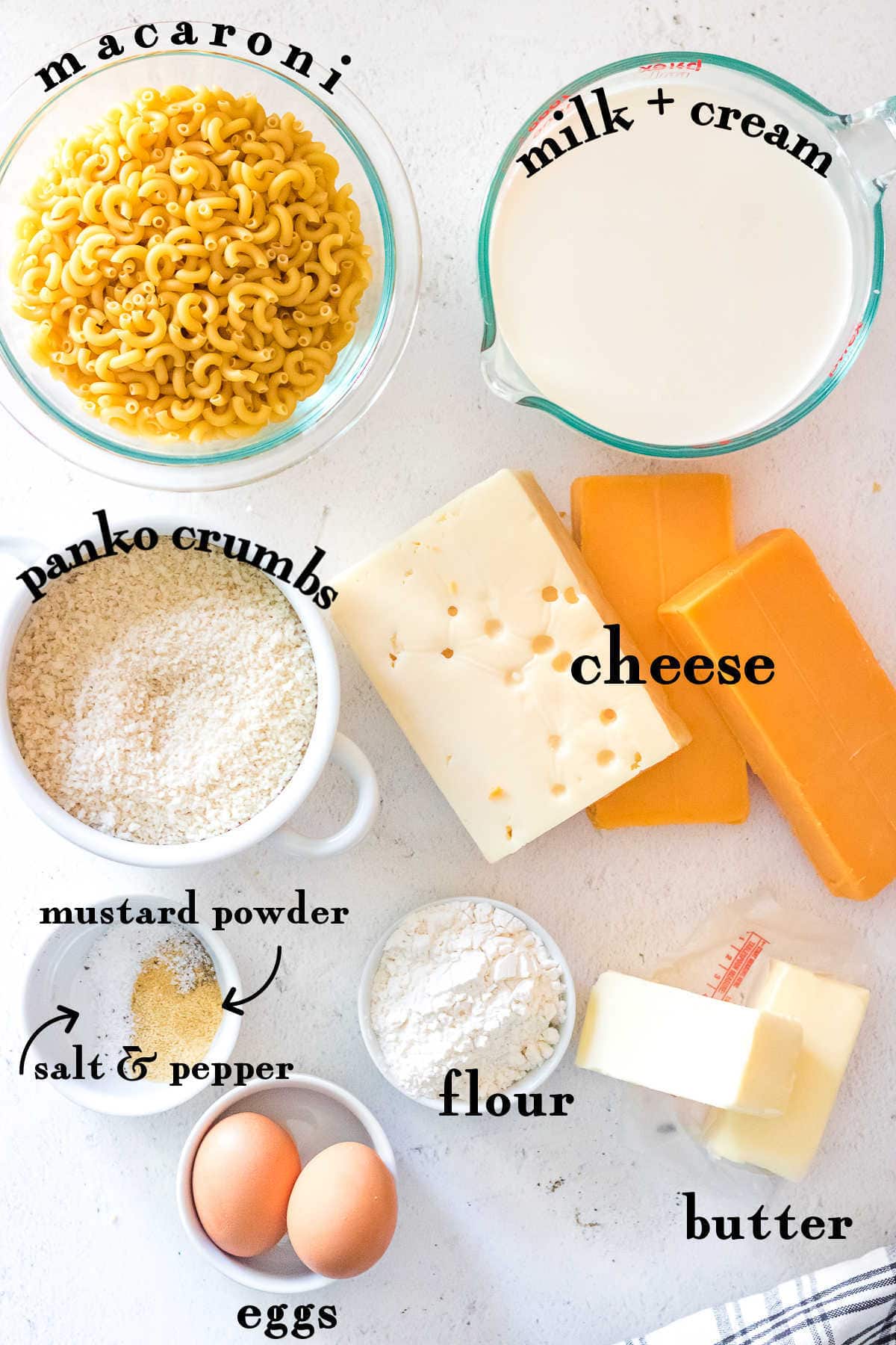 Labeled ingredients for macaroni and cheese recipe.