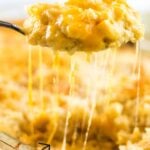 Macaroni and cheese being served. Text overlay for Pinterest.